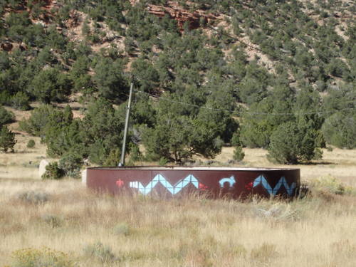 GDMBR: Zuni signs on a water tank.